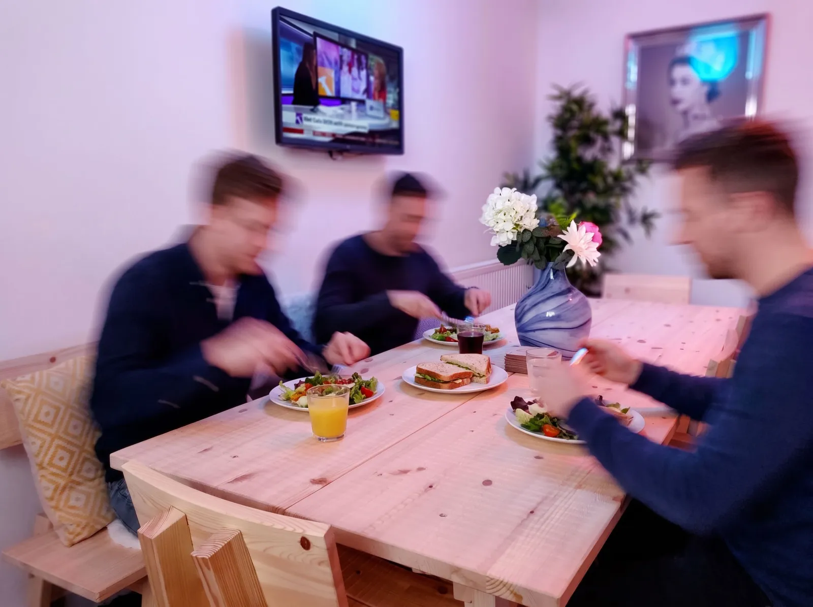 People having lunch in the kitchen