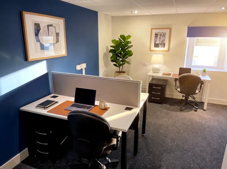 A private office with two desks